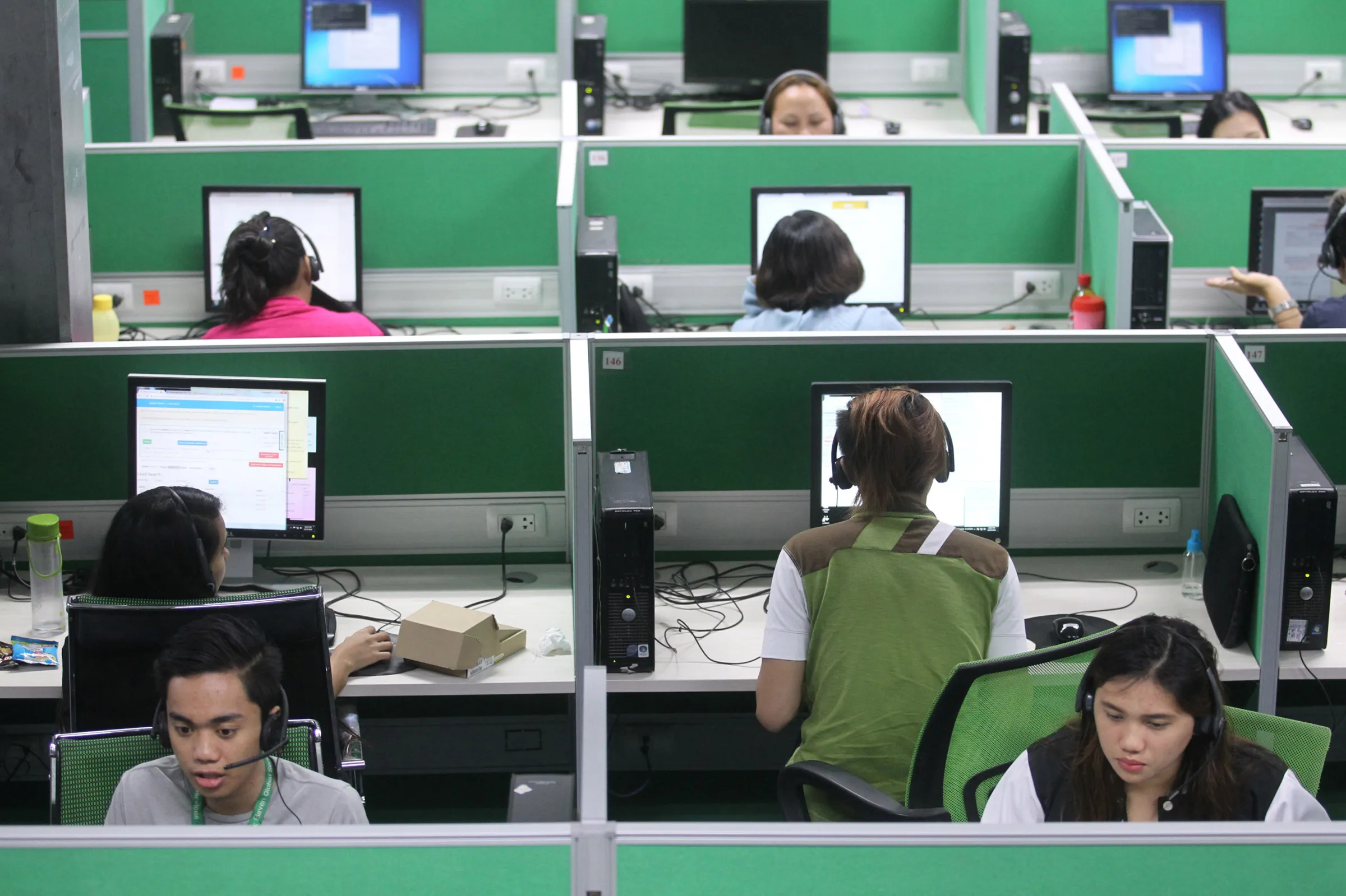Employees work at a call center in Davao city in southern Philippines December 13, 2016. Picture taken December 13, 2016. REUTERS/Lean Daval Jr